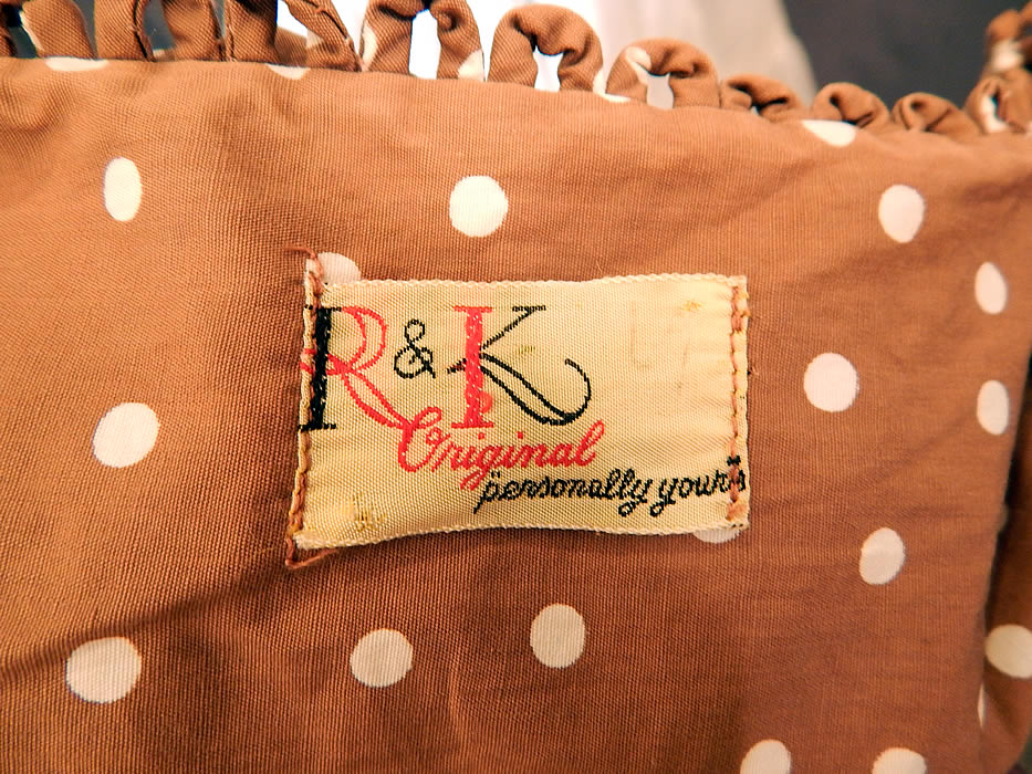 Vintage R & K Original Brown White Polka Dot Print Cotton Circle Skirt Dress
. There is a "R & K Original personally your's" label sewn inside. The dress measures 44 inches long, with a 26 inch waist and 38 inch bust. It is in good condition, with only slight faint fade underarm discoloration which is barely noticeable. This is truly a wonderful piece of retro 1950s wearable art!