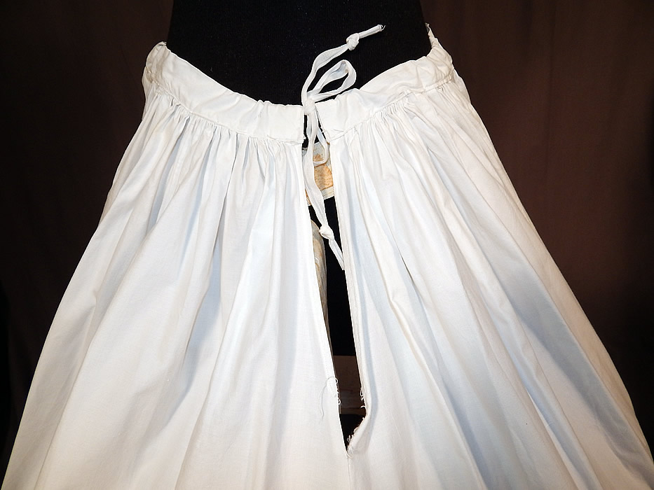 Victorian White Cotton Red Soutache Stitched Embroidery Full Petticoat Skirt
The petticoat measures 36 inches long in the front, 38 inches long in the back, with a 24 inch and up adjustable waist and is 116 inches in circumference at the bottom.