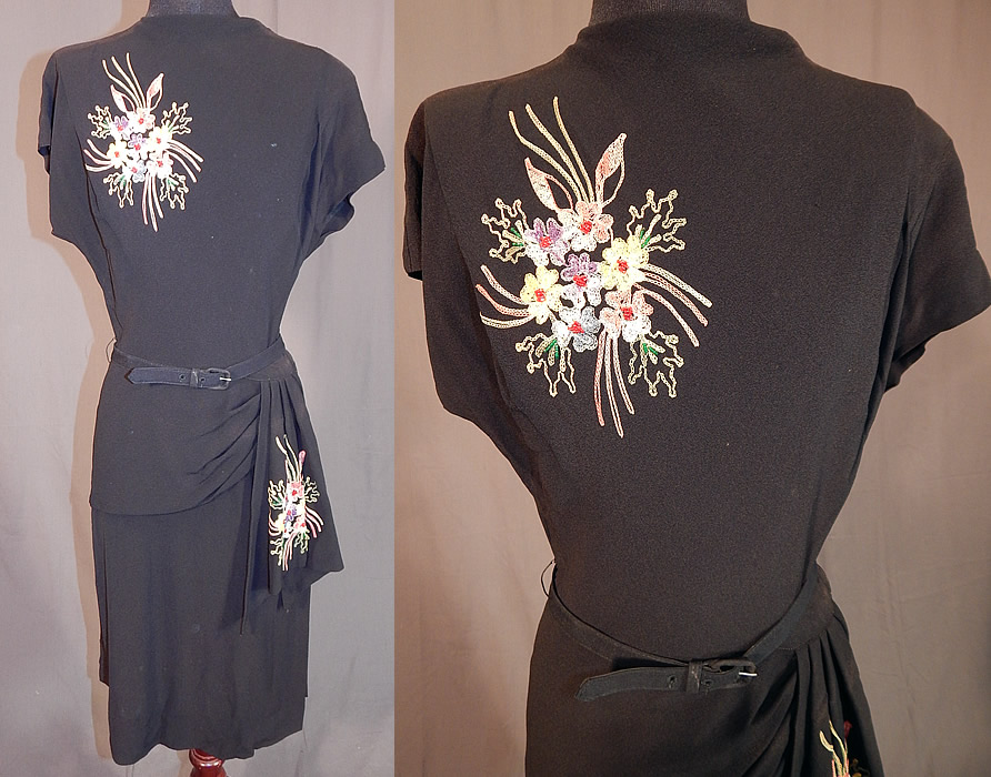 Vintage Black Silk Crepe Chain Stitch Floral Beaded Peplum Cocktail Dress
This vintage black silk crepe chain stitch floral beaded peplum cocktail dress dates from the 1940s. It is made of a black silk crepe de chine fabric, with a colorful chain stitch embroidered floral bouquet accented with red beaded stamen centers. 