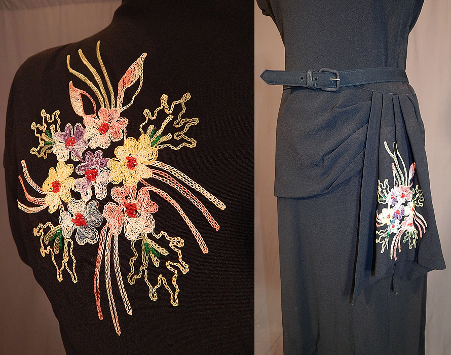 Vintage Black Silk Crepe Chain Stitch Floral Beaded Peplum Cocktail Dress
This fabulous floral cocktail dress has a peplum skirted style fitted waist with side swag drape, short cap sleeves, a fabric belt buckle, side and back zipper closures and is unlined.
