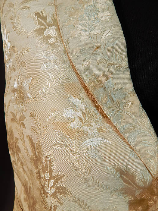 Victorian Gentleman's White Silk Damask Floral Brocade Wedding Waistcoat Vest
This dapper gentleman's wedding waistcoat vest has a V front opening, with a small fold over lapel collar, three front pockets and six silk fabric covered buttons for closure on the front. The vest measures 21 inches long, with a 28 inch waist and 38 inch chest. It is in good condition, with only two small open seams on the side which need minor repair stitching and a few faint small stains on the front (see close-up). This is truly a quality made men's early Victorian vest!