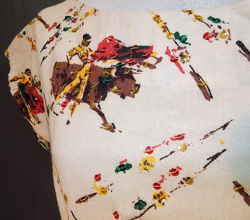 Vintage San Agvstin Taxco Mexico Matador Bull Fighter Novelty Print Circle Skirt Dress
It is made of a 100% wool fabric, with an off white cream color background and colorful novelty print design of bull fighting, matadors accented in hand sewn sequins. 