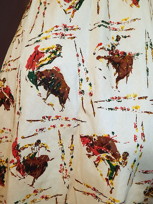 Vintage San Agvstin Taxco Mexico Matador Bull Fighter Novelty Print Circle Skirt Dress
The skirt measures 32 inches long, with a 24 inch waist and 132 inch bottom skirt circumference. There is a matching fabric print blouse, with short cap sleeves, rounded scoop necklines, side zipper closure and is unlined.