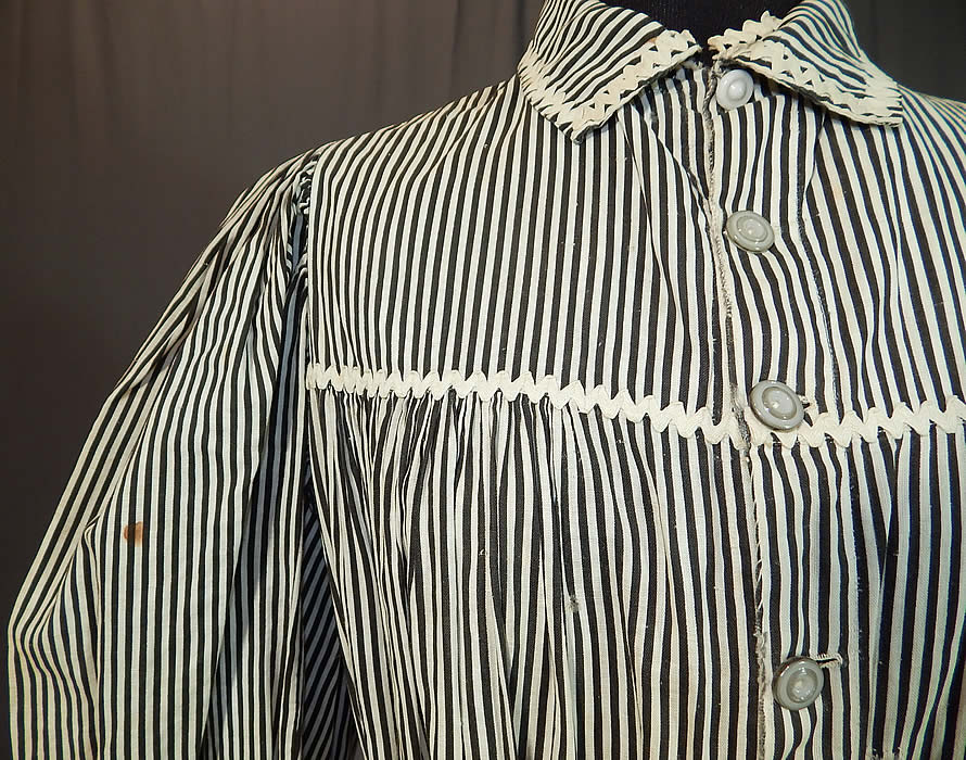 Victorian Black & White Striped Cotton Calico Belted Morning Wrapper Workwear Dress
It is in good as-is condition, has not been cleaned, with a few faint small age spot stains on the sleeve, inside camisole top, some soiling along the inside neck collar and a few tiny woven mended repairs. This is truly a wonderful piece of antique Victoriana textile art! 