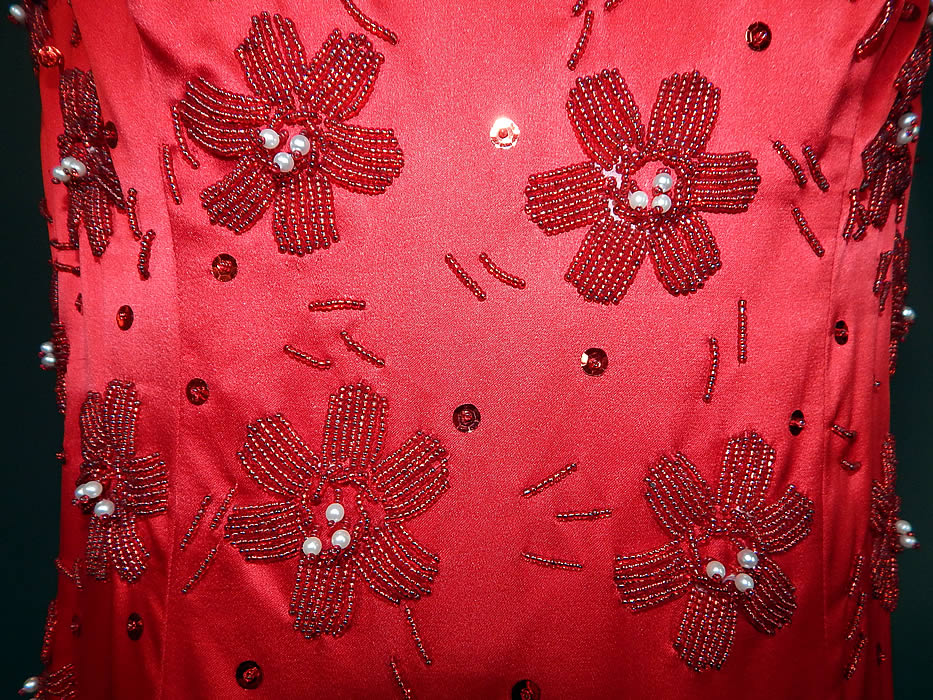 Vintage Red Silk Satin Sequin Pearl Beaded Pinup Wiggle Sheath Dress Evening Gown
The dress measures 51 inches long, with 36 inch hips, a 28 inch waist and 36 inch bust. It is in good condition, with only a couple missing loose sequin beads. This is truly a wonderful piece of custom made wearable beaded art! 