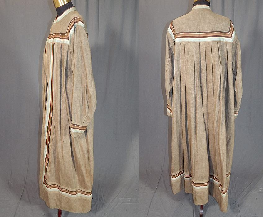 Victorian Taupe Tweed Wool Striped Ribbon Trim Wrapper Morning Dress Robe
This womens winter workwear wrapper morning dress robe is a long floor length, with a pleated back, high band collar, long full sleeves with fitted cuffs, an open front with two hook closures on the top and is fully lined in a heavy cotton twill fabric inside. 
