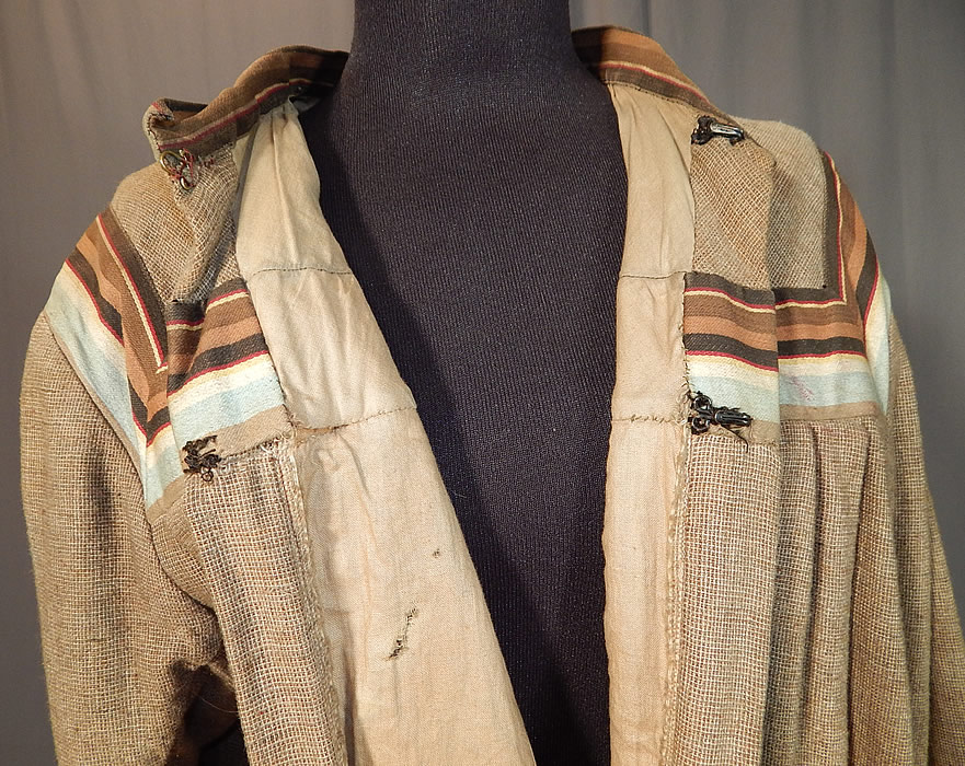 Victorian Taupe Tweed Wool Striped Ribbon Trim Wrapper Morning Dress Robe
It is in good condition, with a small mended repair on the back top and a few small frayed holes on the inside lining. This is truly a wonderful piece of antique Victoriana workwear wearable textile art! 