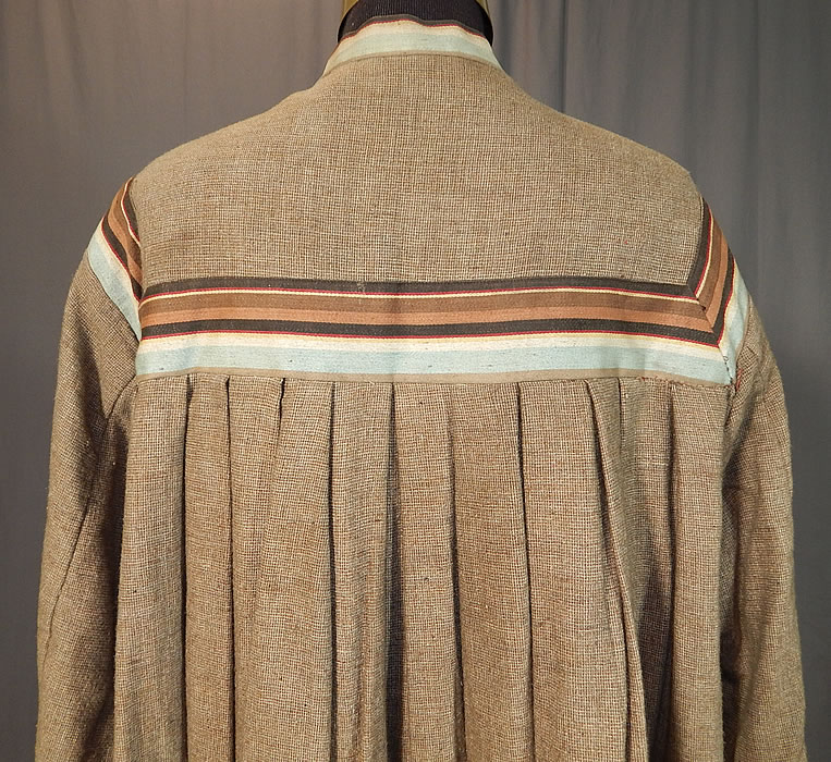 Victorian Taupe Tweed Wool Striped Ribbon Trim Wrapper Morning Dress Robe
The dress measures 50 inches long, with a 48 inch waist, 44 inch bust and 22 inch long sleeves. 
