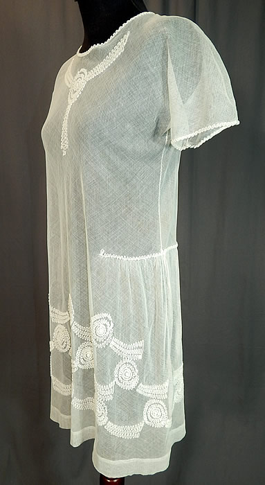 Vintage Girls White Sheer Tulle Net Soutache Ribbon Embroidery Drop Waist Dress
The dress measures 30 inches long, with a 30 inch waist and 30 inch bust. It is in good condition, with only a tiny pin hole on the skirt.