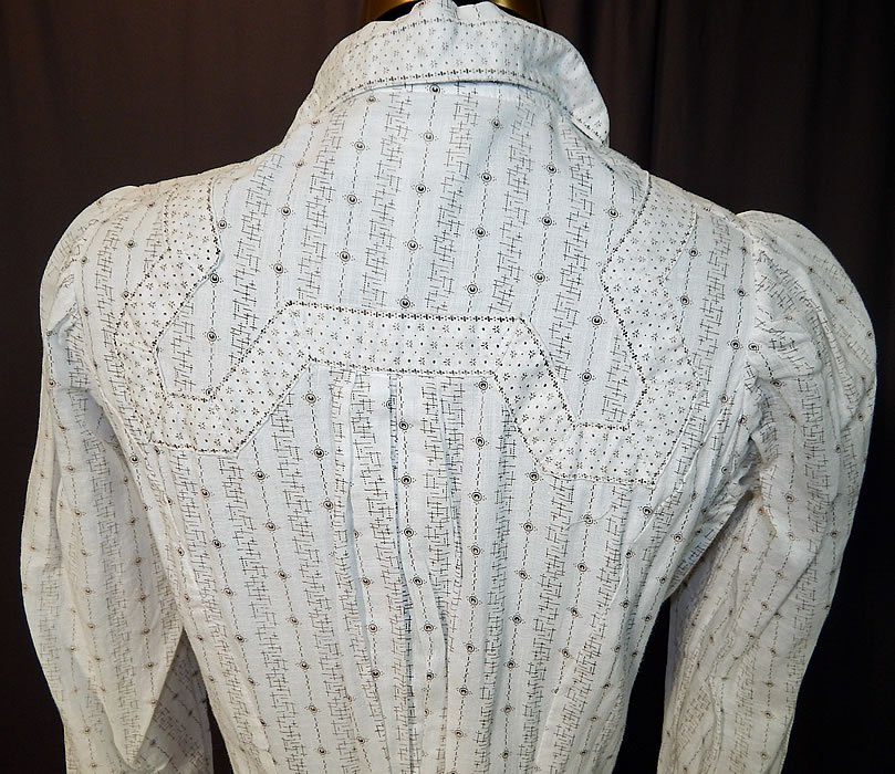 Domestic Wrapper Label Victorian Black & White Cotton Calico Print Workwear Dress
It is in good condition, but has not been laundered, with only some slight fade discoloration and water spot stains along the bottom skirt hemline. This is truly a wonderful piece of antique Victoriana textile art! 