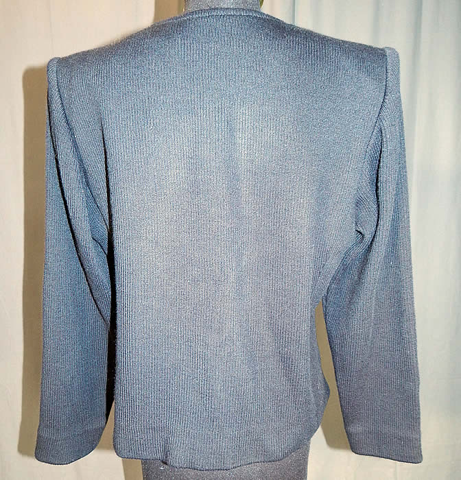 Vintage Saint Laurent Rive Gauche Gold Lam&eacute; Black Knit Suit Jacket
The jacket measures 22 inches long, with a 34 inch waist, 38 inch bust and 22 inch long sleeves. It is in excellent condition. This is truly a wonderful piece of quality made designer wearable art!