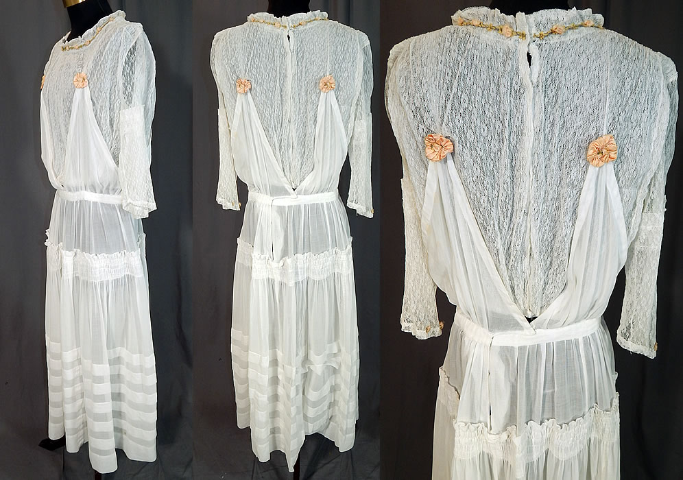 Edwardian White Cotton Lace Pink Silk Rosette Ribbon Trim Pinafore Dress
The dress measures 52 inches long, with a 26 inch waist and 38 inch bust. It is in good condition, but has not been cleaned. with only a small faint stain on the back skirt. This is truly a wonderful piece of antique textile lace art! 