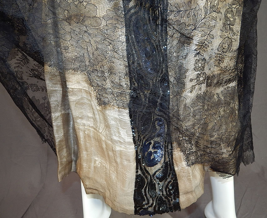 Vintage Art Deco Silver Lam&eacute; Lame Black Chantilly Lace Sequin Beaded Gown
This is truly a rare and exceptional piece of Art Deco wearable textile art! 