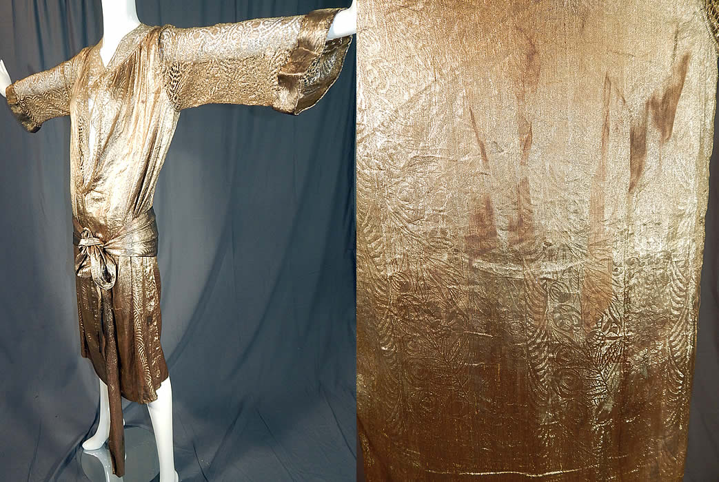 Vintage Art Deco Gold Lam&eacute; Lame Lace Belted Sash Scarf Shift Kaftan Flapper Dress
The dress measures 45 inches long, with 46 inch hips, a 46 inch waist, 42 inch bust and 22 inch long sleeves.
