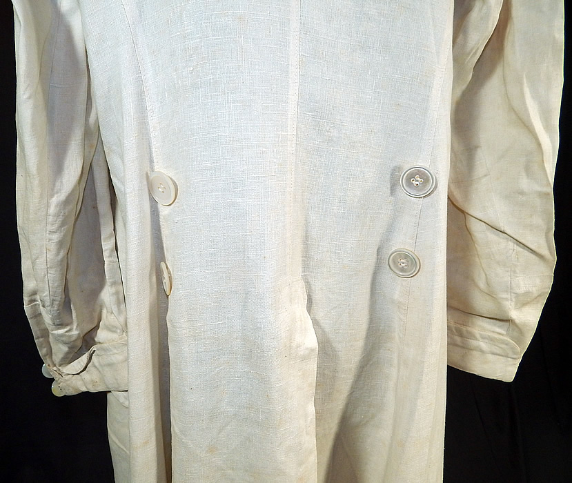 Edwardian Women's White Linen Double Breasted Motoring Driving Duster Coat
The coat measures 49 inches long, with 40 inch hips, a 38 inch waist, 40 inch bust and 24 inch long sleeves. This coat would have been worn to protect ones clothing from the dust and mud when traveling, riding and driving in a motor car. It is in good as-is condition, has not been cleaned with some faint discoloration and stains. This is truly a wonderful piece of wearable outerwear textile art!