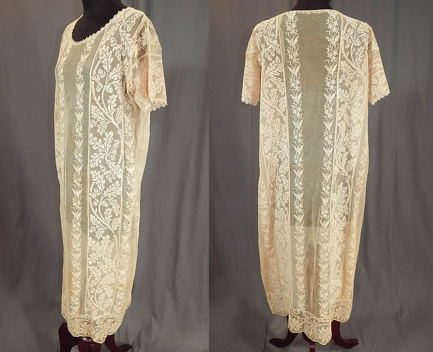 Vintage Embroidered Cream Net Filet Lace Drop Waist Chemise Shift Dress
This lovely lace chemise style shift dress is loose fitting, has a drop waist, short sleeves and is sheer, unlined. The dress measures 43 inches long, with 38 inch hips, a 38 inch waist and 40 inch bust.