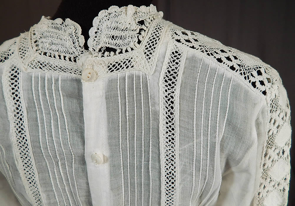 Edwardian White Cotton Batiste Fleur-de-lis Embroidered Lace Lawn Dress Tea Gown
It is in good condition, with only some small separation on the back neckline lace trim (see close-up). This is truly a wonderful piece of wearable antique lace art which could be worn as a wedding or graduation dress!