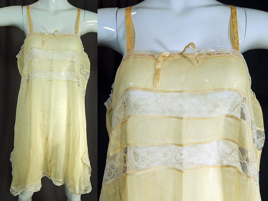 Vintage Yellow Cotton Batiste White Lace Lingerie Chemise Camiknicker Teddy
This vintage yellow cotton batiste white lace lingerie chemise camiknicker teddy dates from the 1920s. It is made of a pastel yellow sheer cotton batiste fabric with white lace trim inserts and edging. 