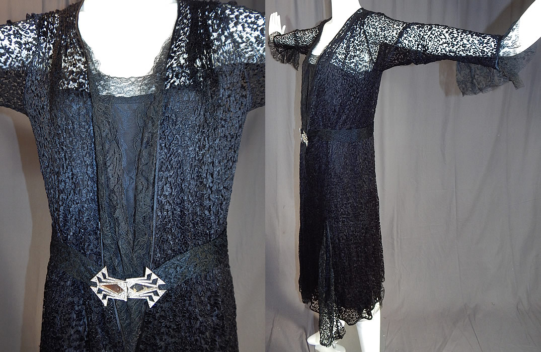 Vintage Art Deco Buckle Belted Black Silk & Chantilly Lace Flapper Dress
This vintage Art Deco buckle belted black silk and Chantilly lace flapper dress dates from the 1920s. 