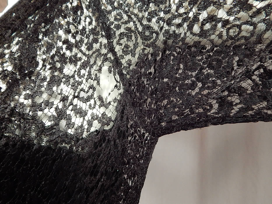 Vintage Art Deco Buckle Belted Black Silk & Chantilly Lace Flapper Dress
It is in good as-is condition, with a small frayed hole under one arm and the buckle clasp is missing some rhinestones including 2 larger stones in the center (see close-ups). This is truly a wonderful piece of wearable Art Deco textile art!