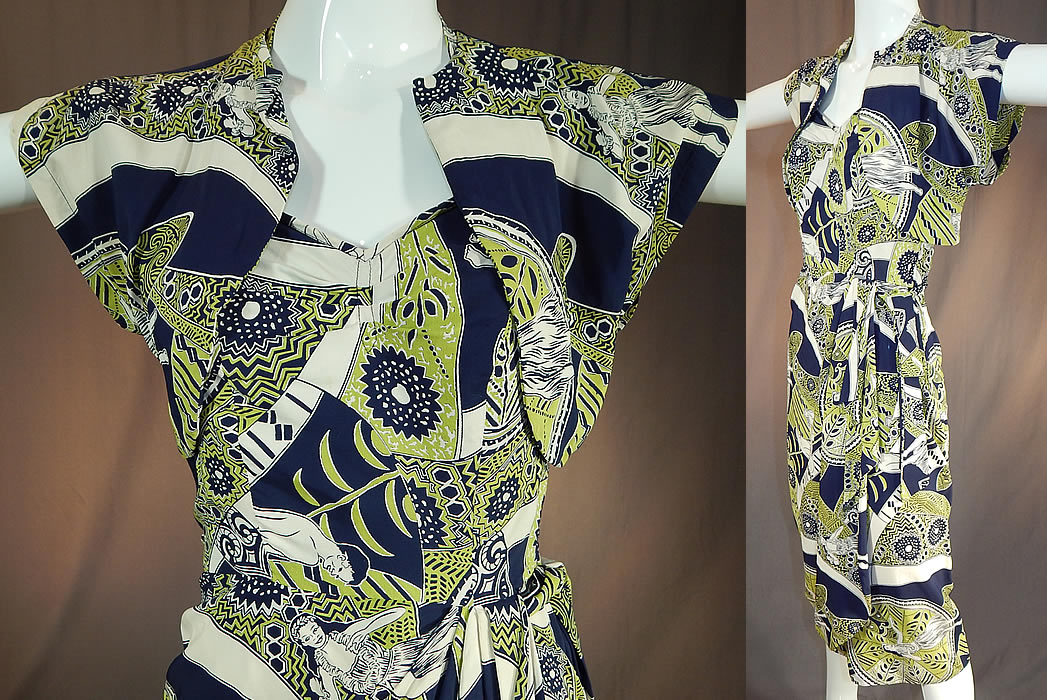 Vintage Poi Pounder Tog Hawaiian Hula Print Rayon Sarong Dress Shrug Jacket
It is made of a chartreuse green, navy blue and white rayon fabric with a Hawaiian figural print of hula dancers and poi pounders.