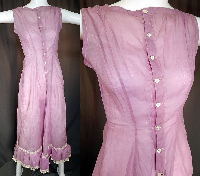 Edwardian Purple Lavender Cotton Batiste White Lace Trim Full Slip Dress
This antique Edwardian era purple lavender cotton batiste white lace trim full slip dress dates from 1910. It is made of a pale purple lavender color cotton batiste fabric, with white lace trim edging along the bottom skirt ruffle.
