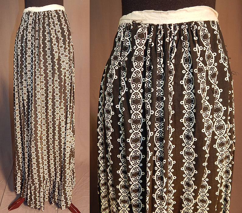 Victorian Black & White Cotton Calico Chain Link Print Workwear Pocket Skirt
This antique Victorian era black and white cotton calico chain link print workwear pocket skirt dates from 1900. It is made of a black and white cotton calico fabric, with an abstract geometric chain link pattern print design.