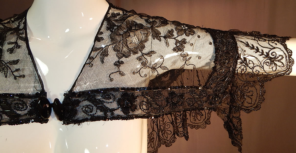 Victorian Black Chantilly Lace Jet Beaded Shawl Collar Fichu Pelerine Cape
The cape measures 16 inches long and 16 inches wide along the back shoulders. 