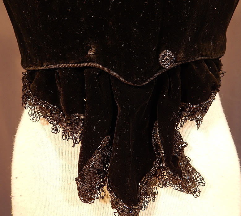 Victorian Black Velvet Silver Trim Swiss Waist Corselet Corset Vest Bodice
The top measures 18 inches long, with a 24 inch waist. It is in good condition, with a small mended repair on the back top and is missing 1 button trim accent off the bottom back.
