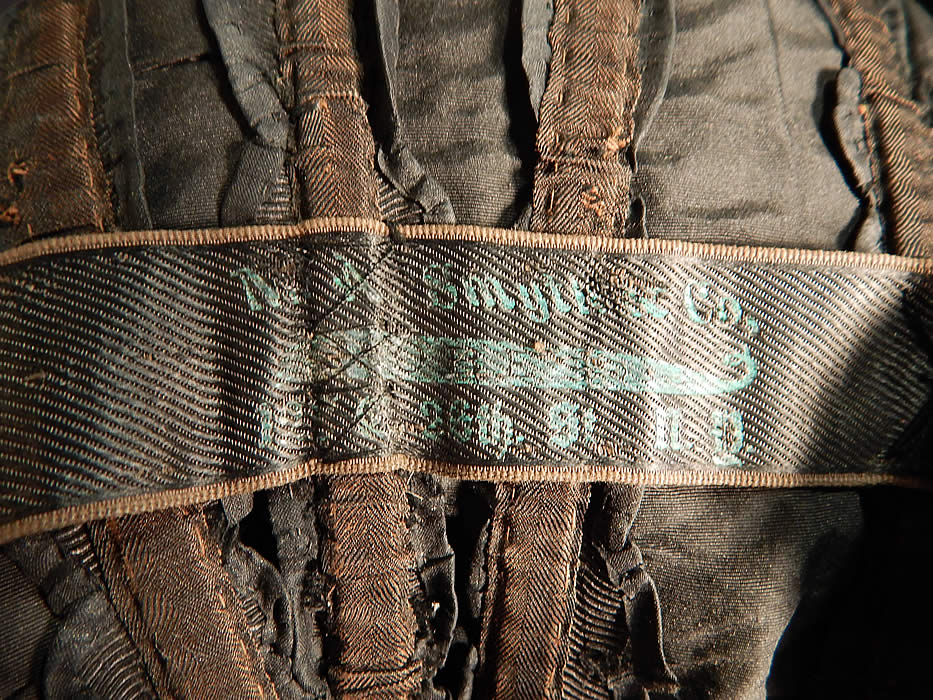 Victorian M.A. Smyth & Co Black Silk Lace Mutton Sleeve Mourning Bodice Jacket
There is an "M.A. Smyth & Co, New York" label sewn inside the waistband. 