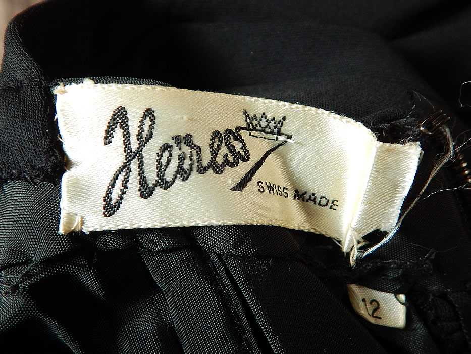 Vintage Heiress Swiss Made Black Silk Jersey Pleated Ruched Sheath Cocktail Dress
There is an "Heiress Swiss Made" designer label and "Sidney Smith Bournemouth, Hants." English store label sewn inside. 