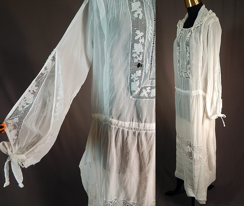 Vintage White Cotton Batiste Embroidered Maltese Bobbin Lace Peasant Dress
It is made of a white cotton batiste fabric, with pleating, raised padded satin stitch embroidery work, drawn cut work, fish net mesh inserts with appliquéd flowers and bobbin lace Maltese cross motif trim. 