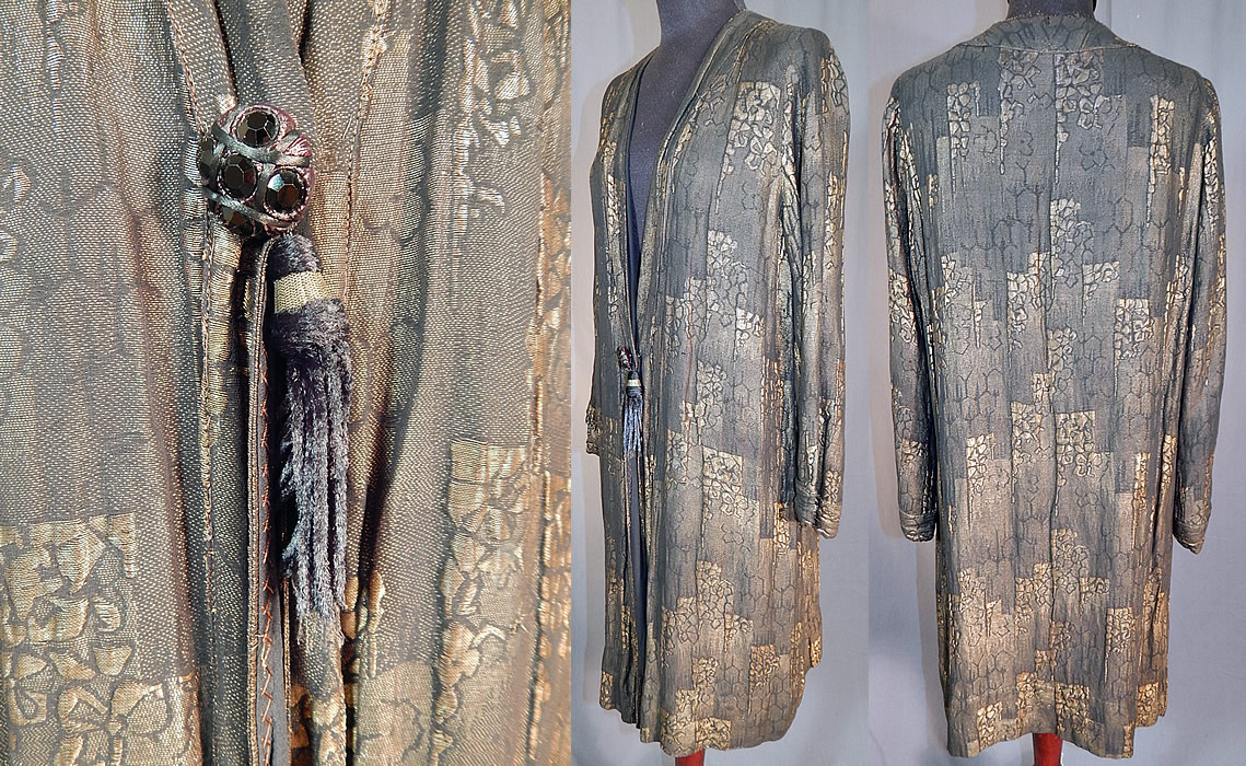 Vintage Art Deco Black Silk Gold Lamé Lame Long Flapper Coat Jacket Tassel Trim
There is a gold woven silk, black faceted glass beaded button and black silk tassel trim hanging down the front from the snap closure hidden underneath.