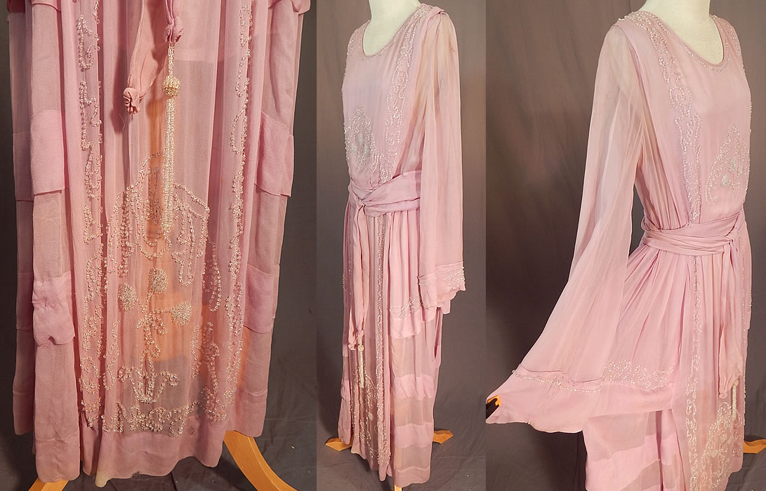 Edwardian Lilac Silk Chiffon Crystal Beaded Belted Evening Gown Dress
The dress measures 52 inches long, with a 28 inch waist, 36 inch bust and 25 inch long sleeves.