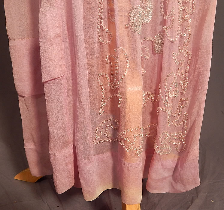 Edwardian Lilac Silk Chiffon Crystal Beaded Belted Evening Gown Dress
It is in good as-is condition, missing one beaded tassel end off the belt, with some small stains along the shoulders sleeves, faint underarm stains, slight fade discoloration and fraying along the bottom skirt hemline (see close-ups). 