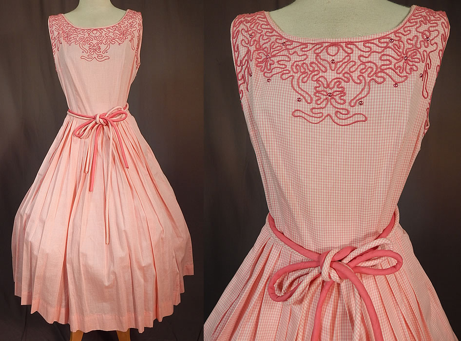 Vintage Henry Allen Montreal Pink White Cotton Check Gingham Circle Skirt Dress
This vintage Henry Allen Montreal pink and white cotton check gingham circle skirt dress dates from the 1950s. It is made of a pink and white cotton checkered gingham fabric, with pink soutache raised embroidery work and pink beaded trim edging the neckline and arm holes.