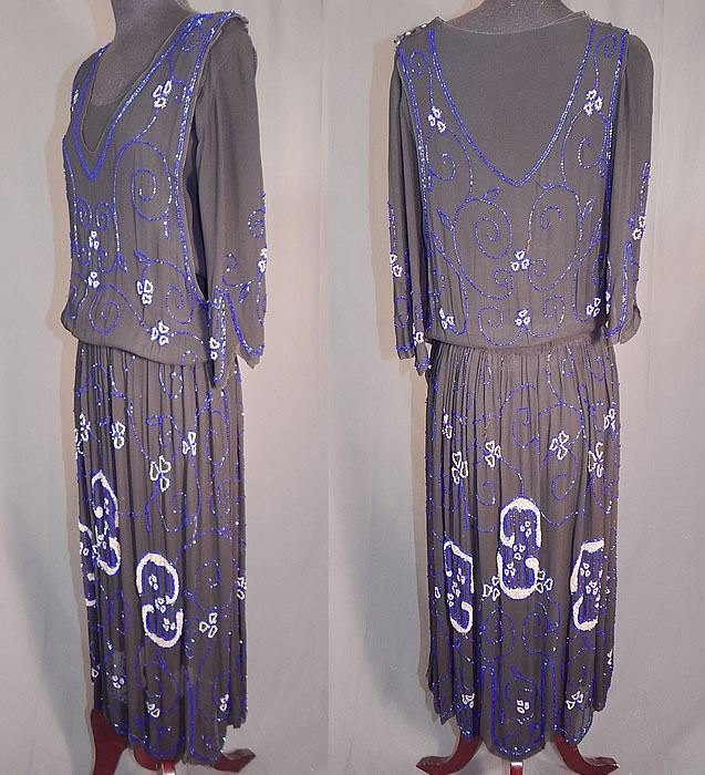 Vintage Art Deco Black Silk Pink & Cobalt Blue Beaded Spiral Floral Flapper Dress
The dress measures 50 inches long, with a 26 inch waist and 32 inch bust. I