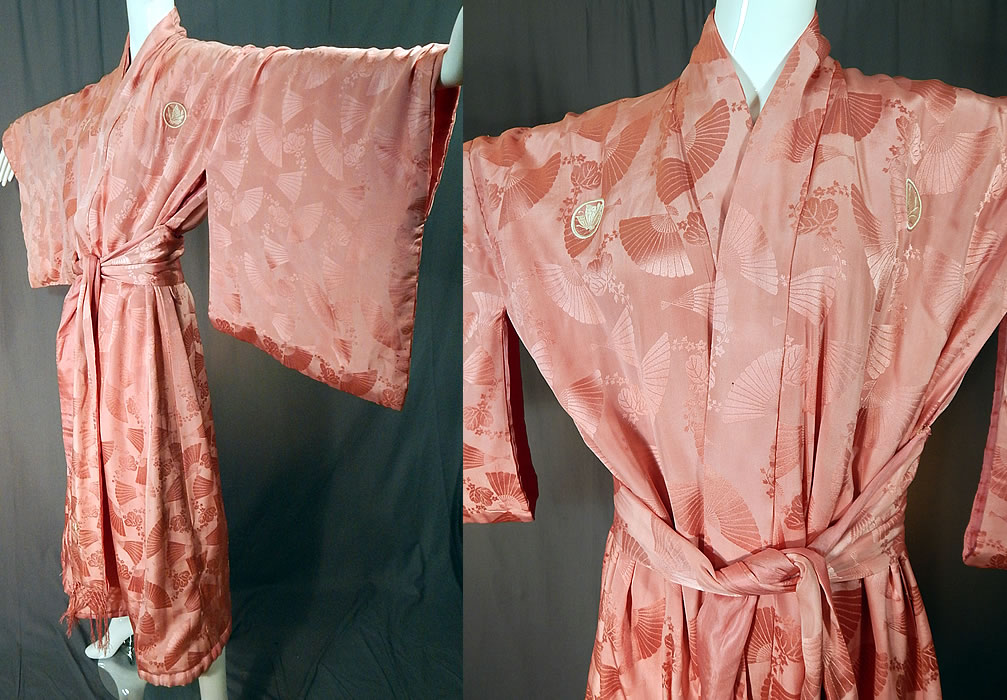 Vintage Japanese Pink Silk Damask Fan Floral Embroidered Mon Belted Kimono Robe
It is made of a pink silk damask weave fabric with a fan and leaf pattern design woven into the fabric. 