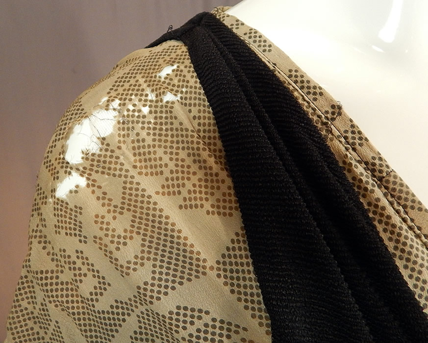 Vintage Art Deco Silk Print Top Black Jersey Knit Pinafore Dress & Beaded Belt
It is in fair as-is condition, with several frayed splits on the silk top along the shoulders, underarms, tiny holes on the back top and staining discoloration on the back and underarms (see close-ups). 