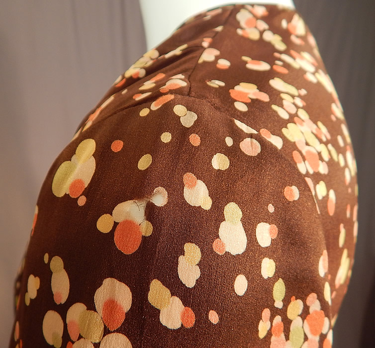 Vintage Brown Silk Polka Dot Bubble Print Belted Wrap Bias Cut Dress
It is in fair as-is condition, with a few frayed small splits along the shoulders and underarms (see close-up). This is truly a wonderful piece of wearable art which would be great for design inspiration! 