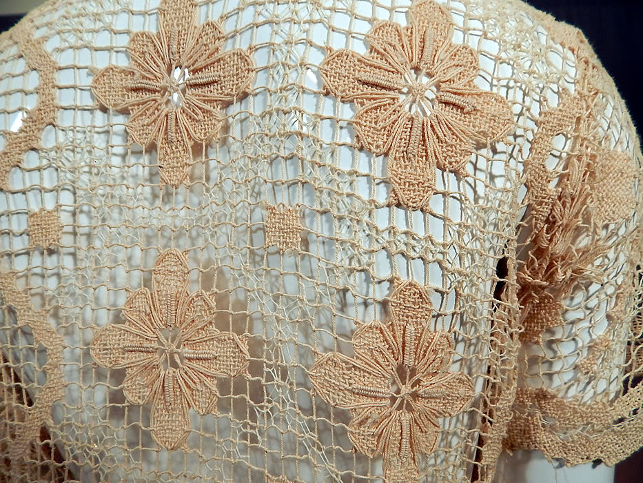 Vintage Boho Cream Crochet Lace Mesh Net Fishnet Side Slit Skirt Shift Dress
The dress measures 50 inches long, with a 38 inch bust, 34 inch waist and 40 inch hips. It is in excellent condition. This is truly a wonderful piece of wearable lace art!