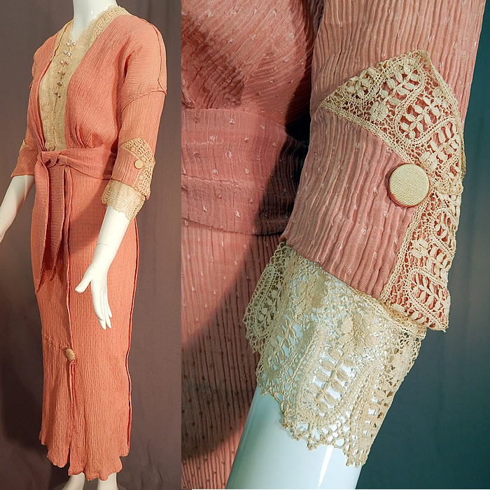 Edwardian Titanic Pleated Pink Silk Crepe Polka Dot Braided Bobbin Lace Dress
This pretty pink dress has a fitted hobble skirt style, with button trim accents, tiny hand painted pink porcelain round buttons decorating the front top with hidden hook closures underneath, snap closures on the front side skirt, 3/4 length sleeves with rolled cuffs, a fitted waist with attached sash tie belt and is unlined. 