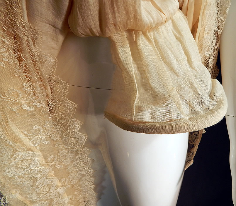 Vintage Robe de Style Yellow Cream Silk Rosette Ribbon Lace Pannier Hoop Dress
The dress measures 44 inches long, with a 36 inch bust and 32 inch waist.