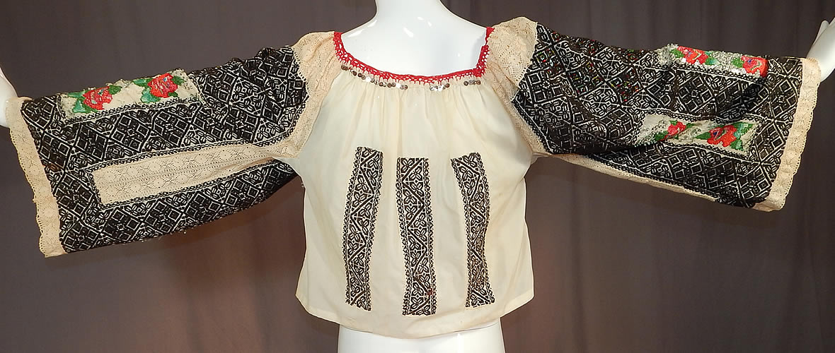 Vintage Romanian Hand Embroidery Black & White Lace Beaded Boho Peasant Blouse
This is truly a rare and wonderful piece of wearable Romanian peasant textile folk art! 