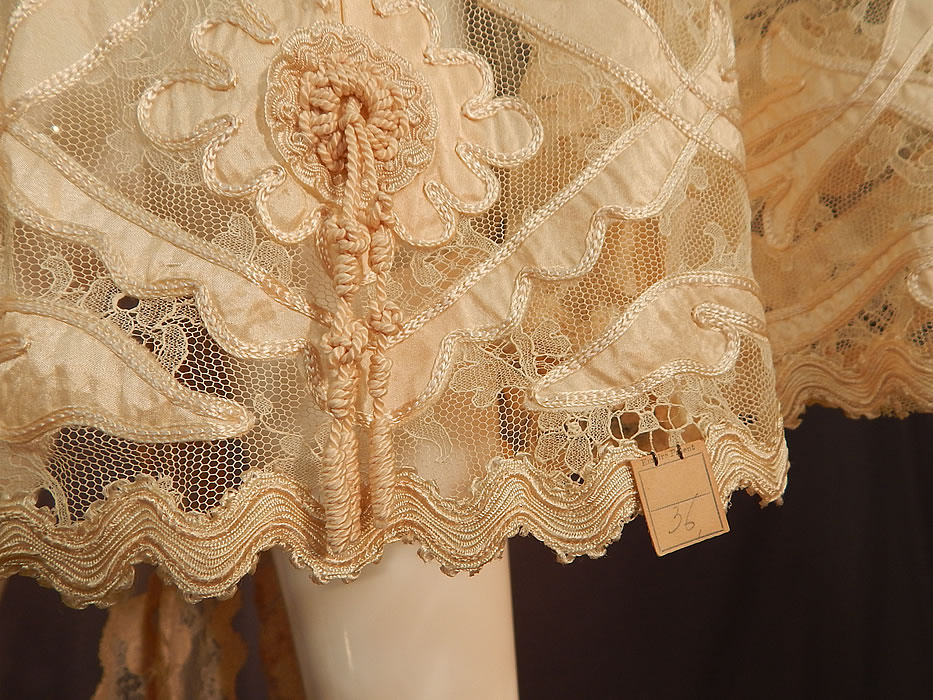 Victorian Blonde Chantilly Lace Cream Silk Applique Trim Bell Sleeve Coat Jacket
It is in good condition, never worn, with the original paper tag still attached on the bottom back hem "Empire Patent 36" and does have some slight small frayed splits along the silk ribbon appliqu&eacute; trim. 