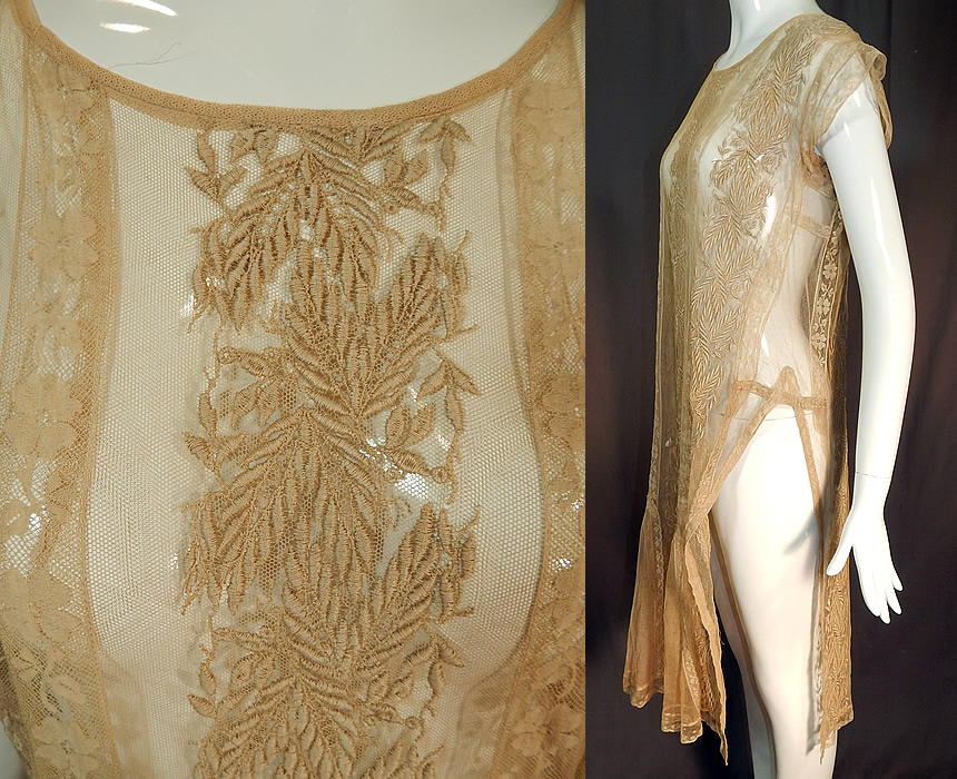 Vintage Embroidered Ecru Net Lace Tabard High Slit Chemise Shift Dress
This lovely lace chemise tabard style shift dress is loose fitting, with high slits along the skirt sides, short cap lace sleeves, a weighted hemline and is sheer, unlined. 