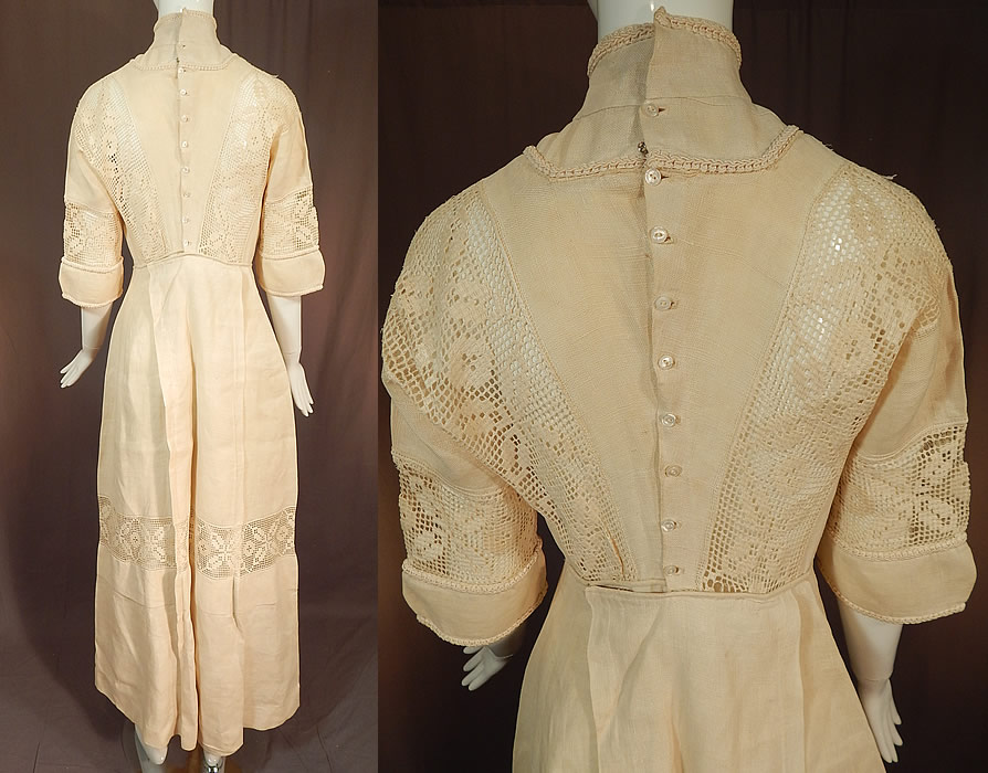 Edwardian Cream Color Linen Filet Lace Tea Gown Dress
This lovely linen and lace tea gown dress has a high neck collar with braided trim edging, 3/4 length sleeves, a sheer filet lace front bodice, fitted waist with linen buckle trim front, a long floor length skirt with back pleat center panel, buttons down the back for closure and is sheer, unlined. 