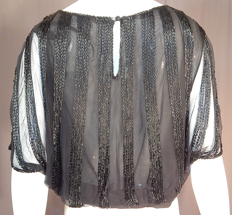 Vintage Art Deco Sheer Black Silk Beaded Batwing Sleeve Blouse Shirt Top
The blouse measures 17 inches long, with a 44 inch bust and 34 inch waist. It is in excellent condition. This is truly a wonderful piece of Art Deco beaded wearable art!