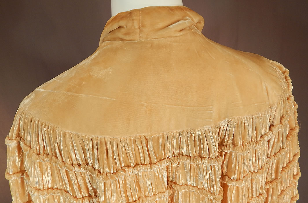 Vintage Art Deco Ruched Pleated Cream Silk Velvet Flapper Evening Cloak Cape
It is in good condition, with only some slight soiling along the back neck collar (see close-up). This is truly a wonderful piece of Art Deco wearable art! 