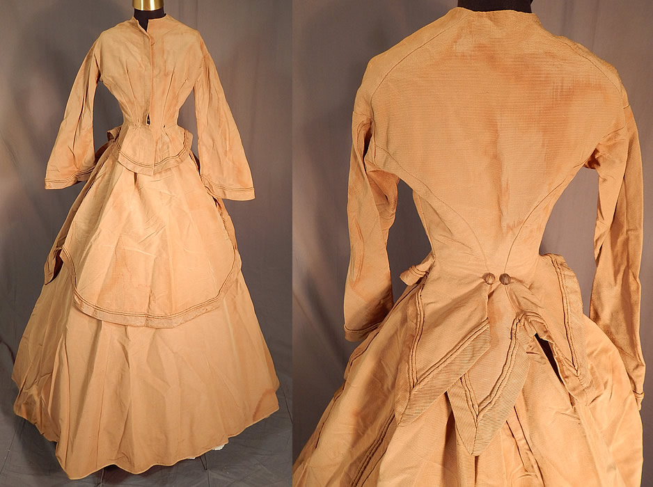 Victorian Khaki Brown Silk Wool Grosgrain Bustle Gown Hoop Skirt Dress
This antique Victorian era khaki brown silk wool grosgrain bustle gown hoop skirt dress dates from 1870. It is made of a light yellowish brown beige khaki color silk wool blend grosgrain corded fabric with a ribbed texture. 